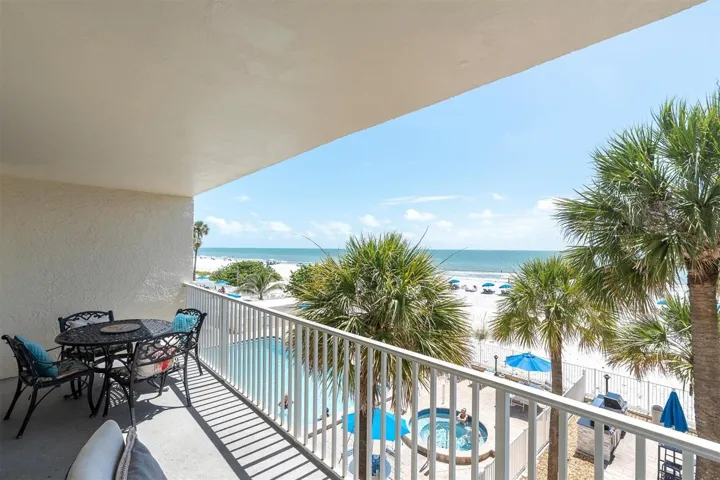 Large Balcony overlooking pool and beach