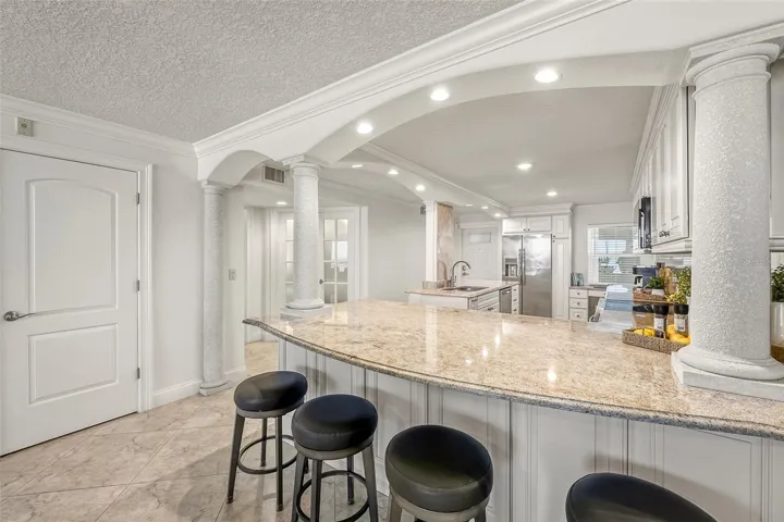 Breakfast Bar with Storage Cabinets beneath
