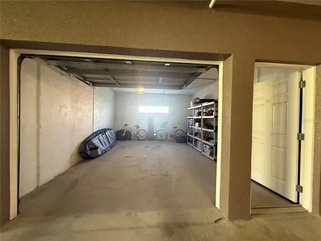 Oversized single car garage with room for workbench