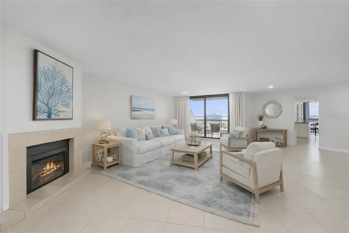 Virtually Staged - Living Room with electric fireplace and views of the water