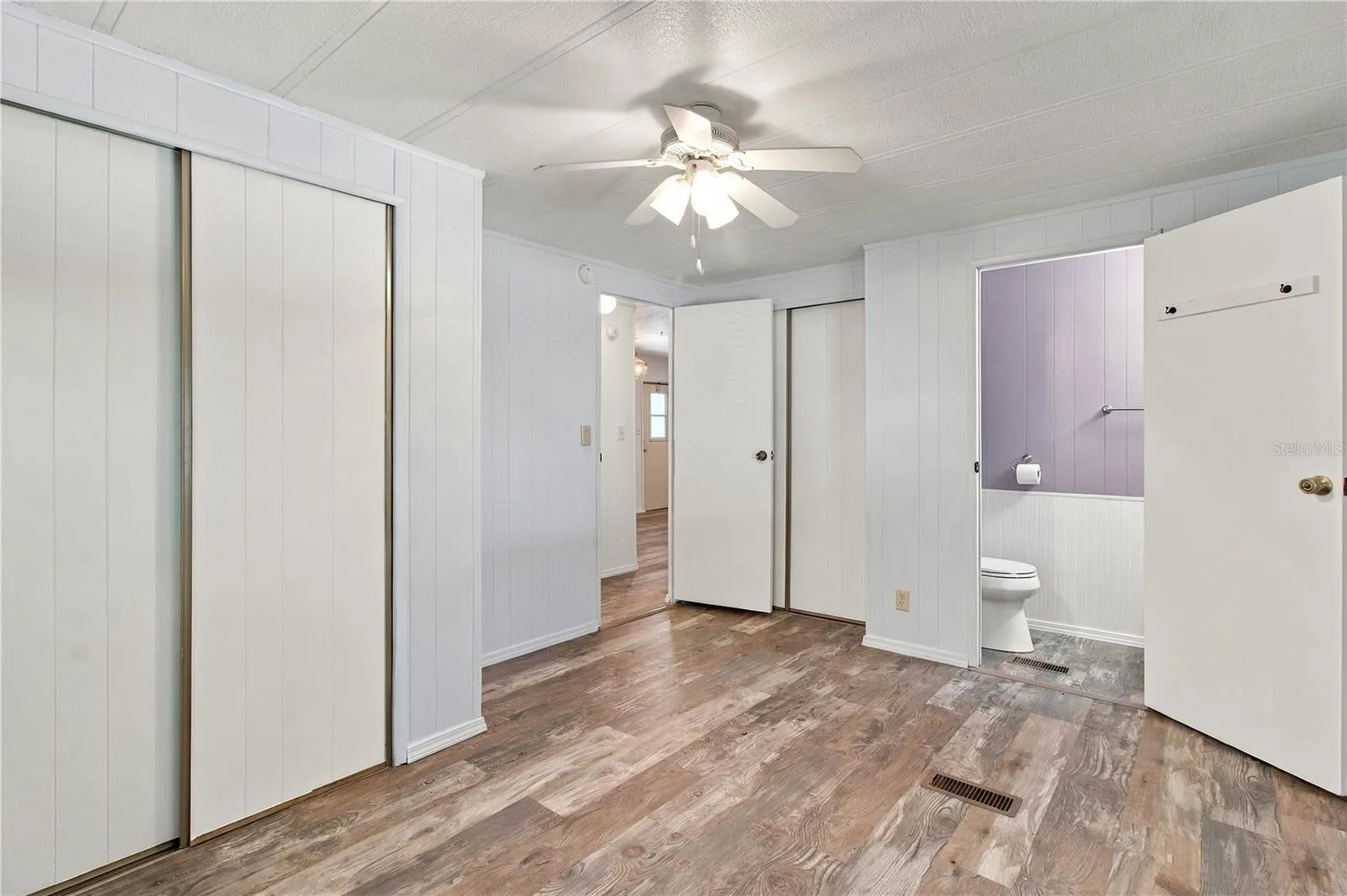 Primary Bedroom w/half bath