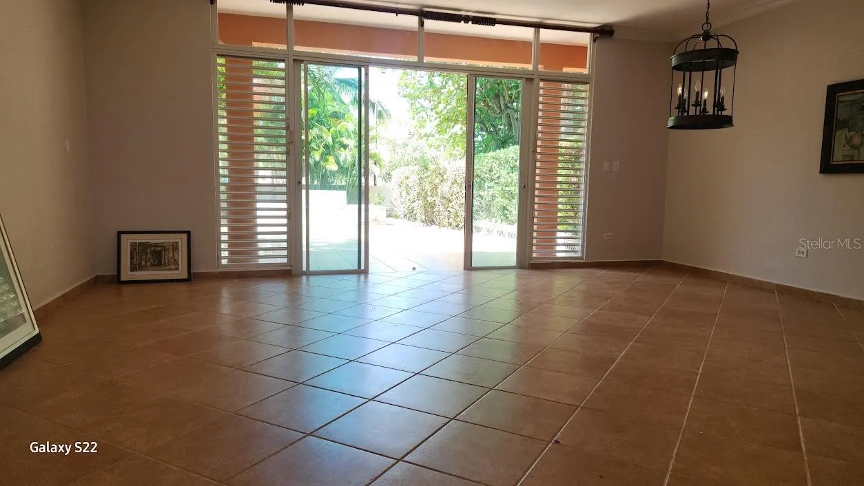Spacious open plan leading you to a semi covered courtyard