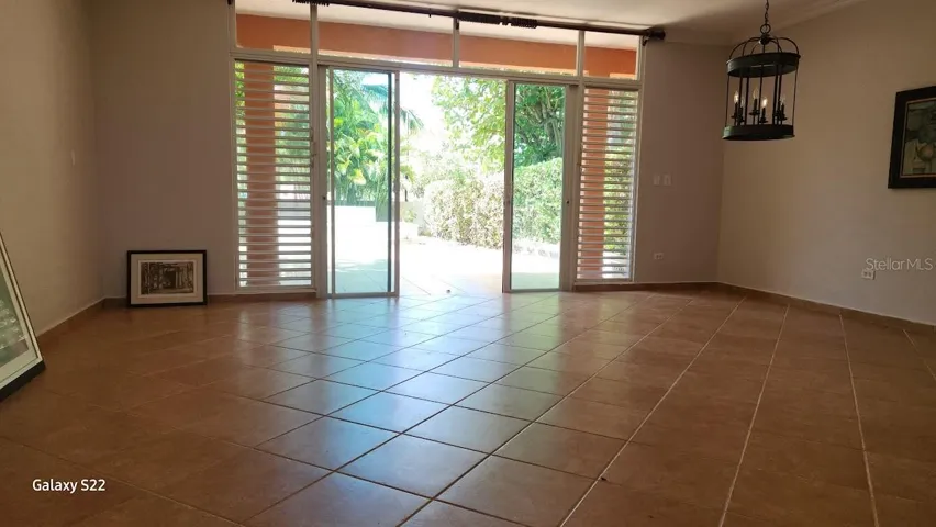 Spacious open plan leading you to a semi covered courtyard