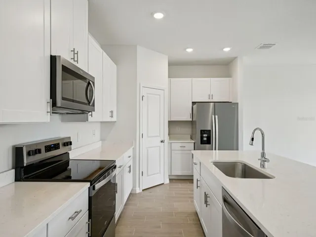 Interior photos are not of the actual home but are photos of the builder home with the same floorplan with similar interior finishes and features.