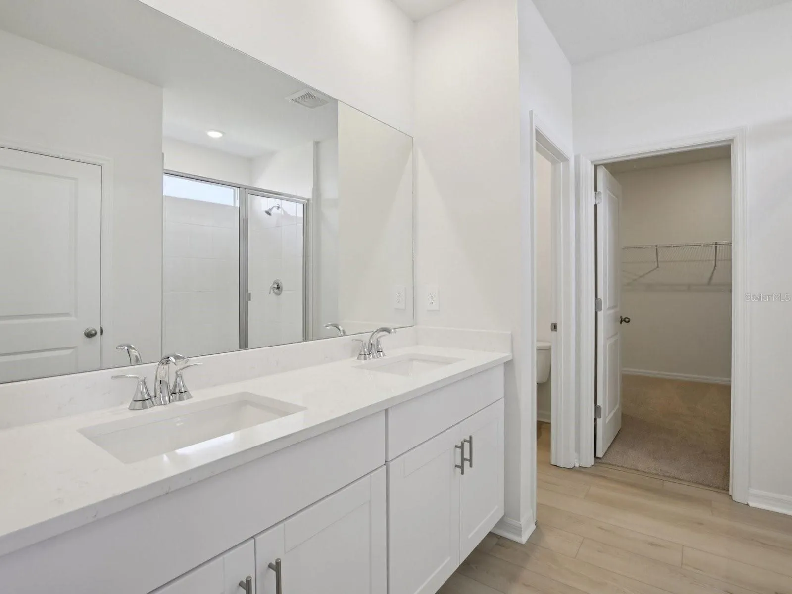 Interior photos are not of the actual home but are photos of the builder home with the same floorplan with similar interior finishes and features.