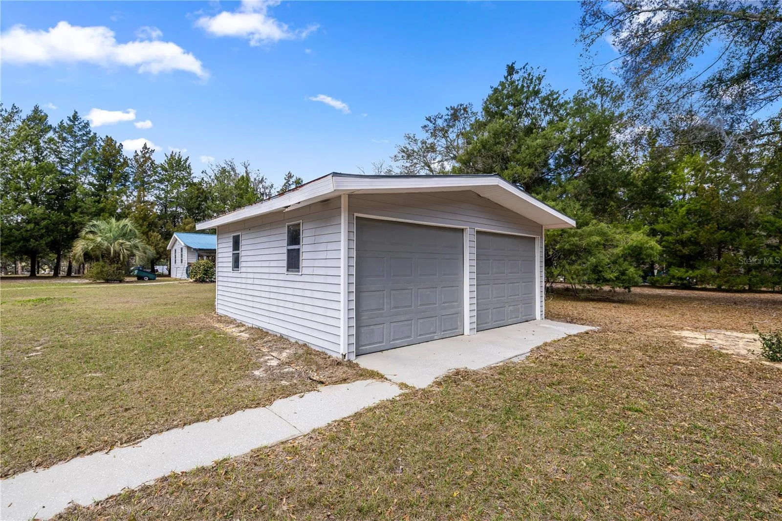 double garage with sidewalk to house