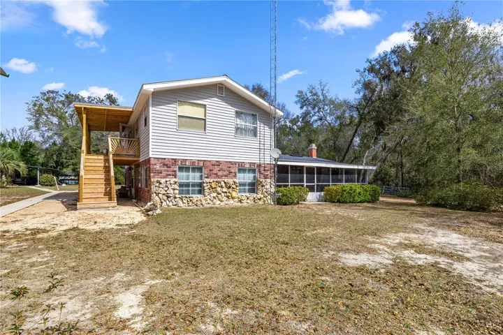 side of home with lanai