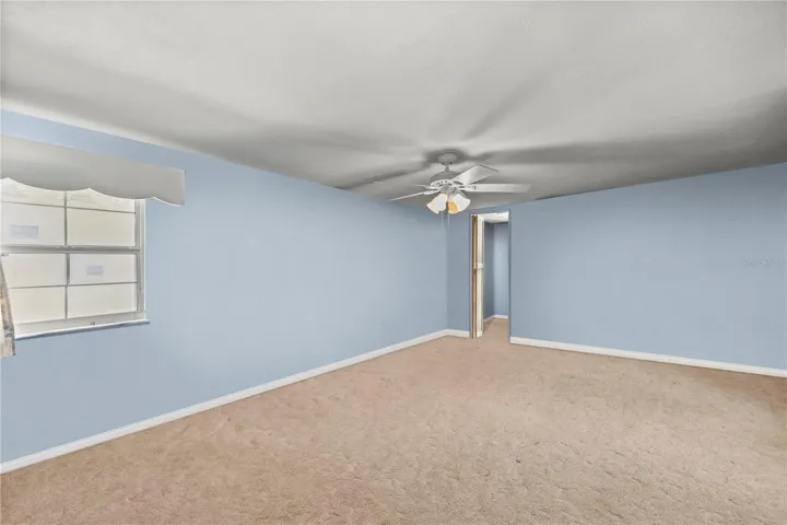 primary bedroom with two  closets virtual staged