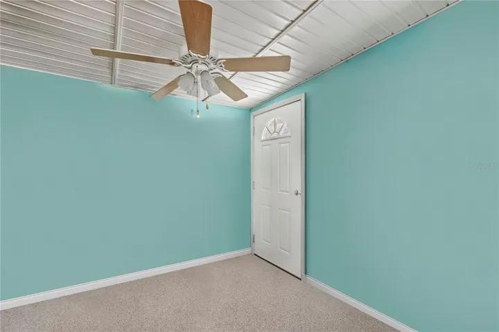 Mudroom/study leading from garage  entry 1st floor of family room virtual stage
