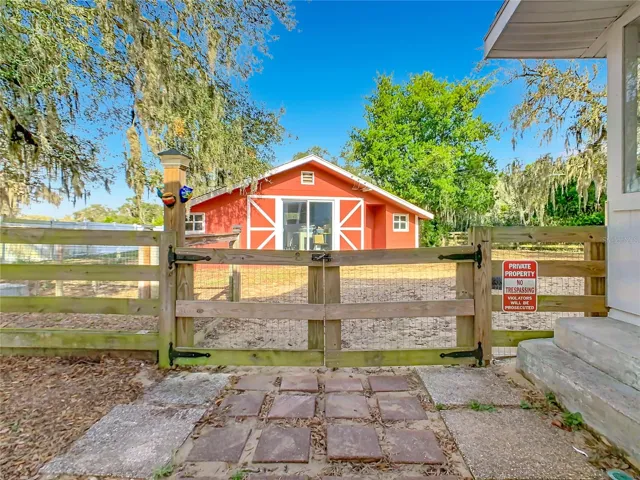 This building was previously used as an In-Law quarters and it has a bedroom & bathroom.  It's only used for storage now and would take some remodeling and has the potential be used again as living space.