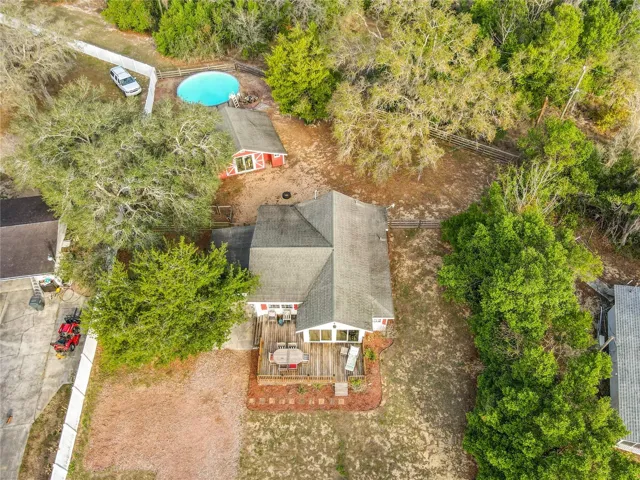 Aerial view of the home and back yard area
