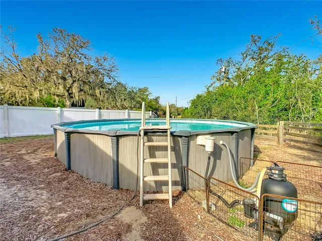 Above ground pool is 24' in diameter.