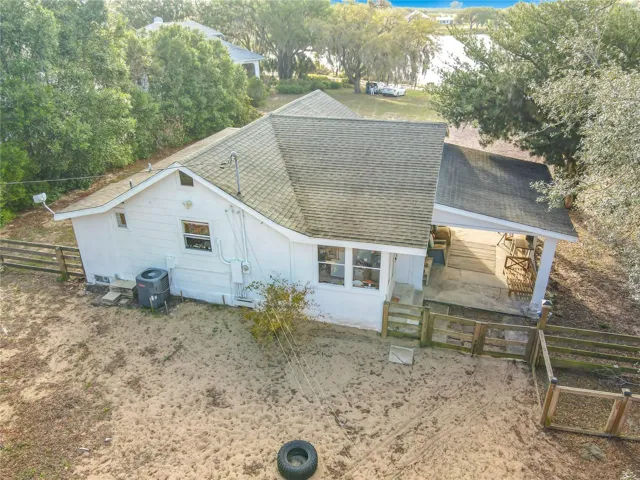Back view of the home and yard.