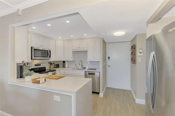 FULL VIEW OF THE KITCHEN WITH EVERY AMENITY