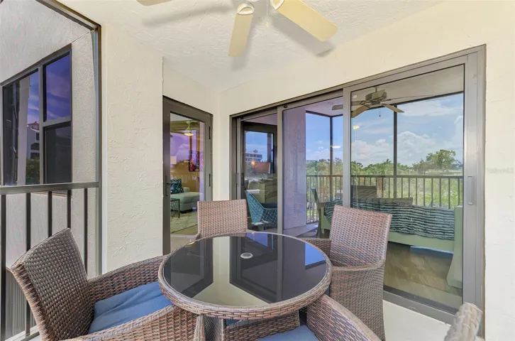 LANAI WITH GLASS DOORS TO LIVING ROOM AND BEDROOM