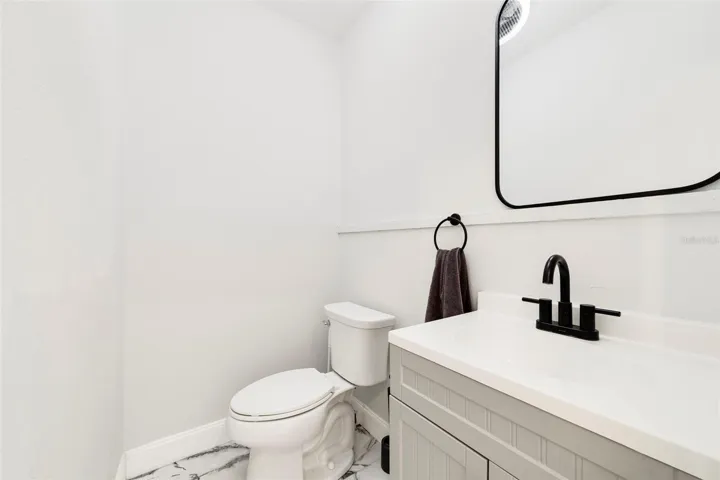 Convenient main floor half bath.