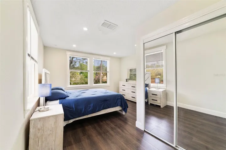 Fourth bedroom features a built-in closet and large walk-in closet that can also be used as an office/study area.