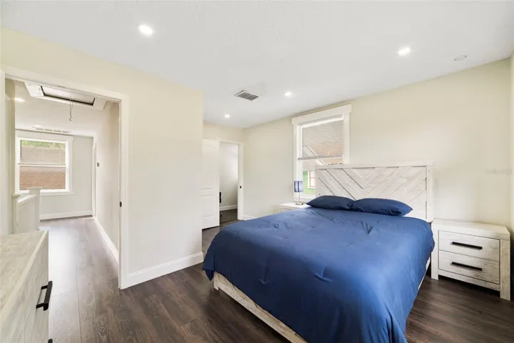 Fourth bedroom features a built-in closet and large walk-in closet that can also be used as an office/study area.