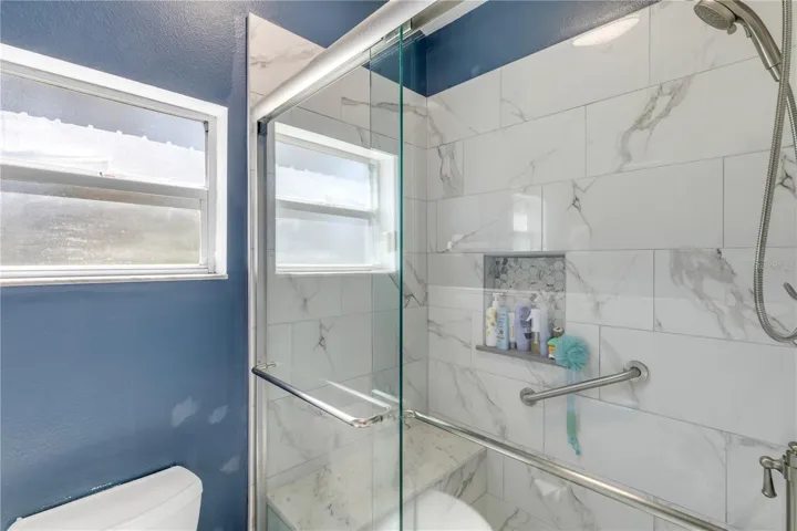 Primary shower recently renovated.
