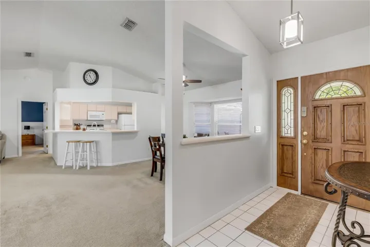 Foyer opens to great room.
