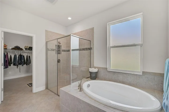 Deep soaking tub and easy walk-in shower