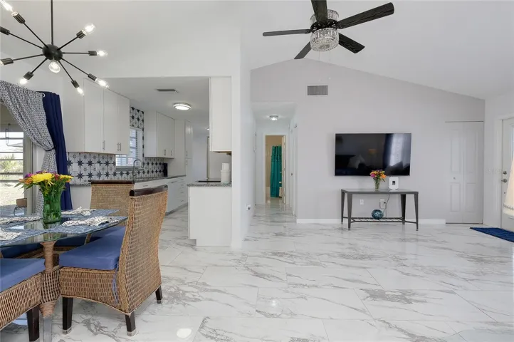 Opulent Marble-Look Floors, New Fans, Lighting Throughout