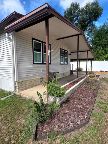 Front planter &amp; covered patio.