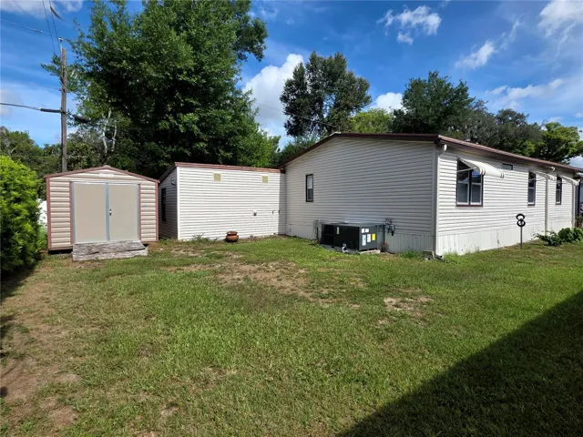 Back yard with freestanding shed.