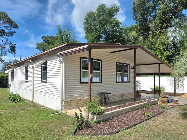 Front, North facing with covered front patio.