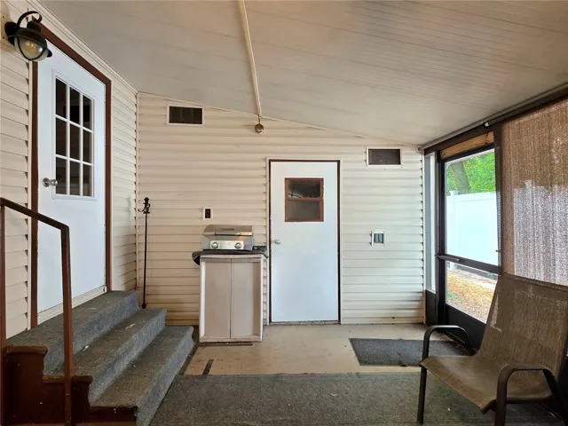 Door to Laundry room on the Left &amp; attached utility/golf cart straight ahead.