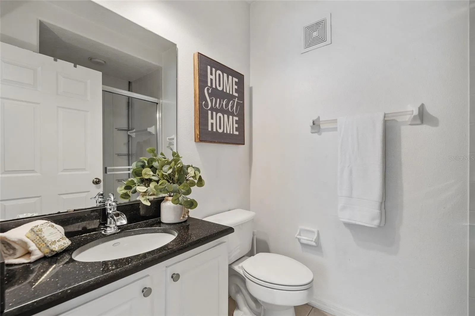 Ensuite bathroom connected to bedroom/office space