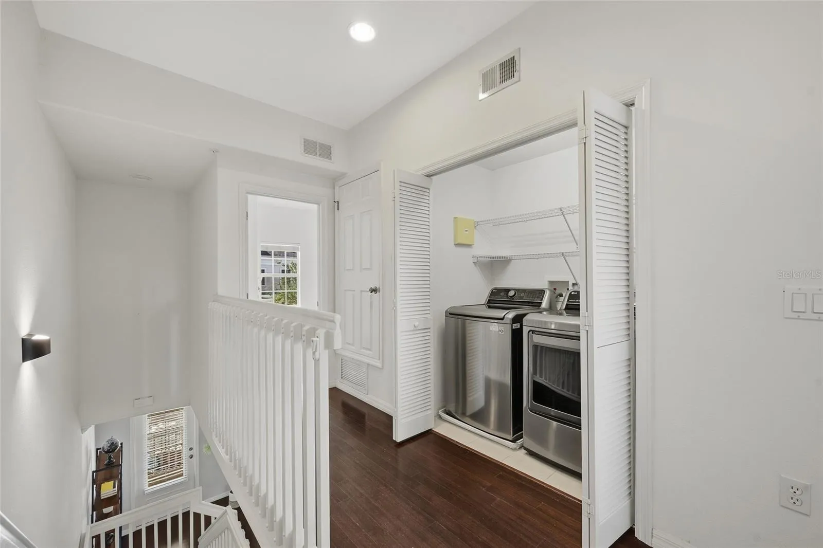 Upper-Level Laundry Convenient upstairs laundry with full-size washer and dryer.