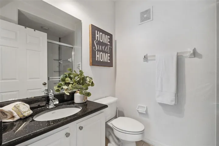 Ensuite bathroom connected to bedroom/office space
