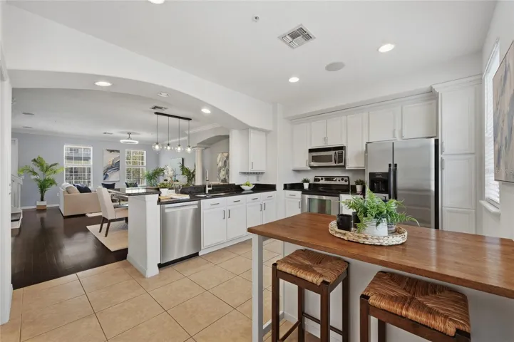 Kitchen / Breakfast Area Light-filled kitchen with ample space for casual dining or a breakfast table.