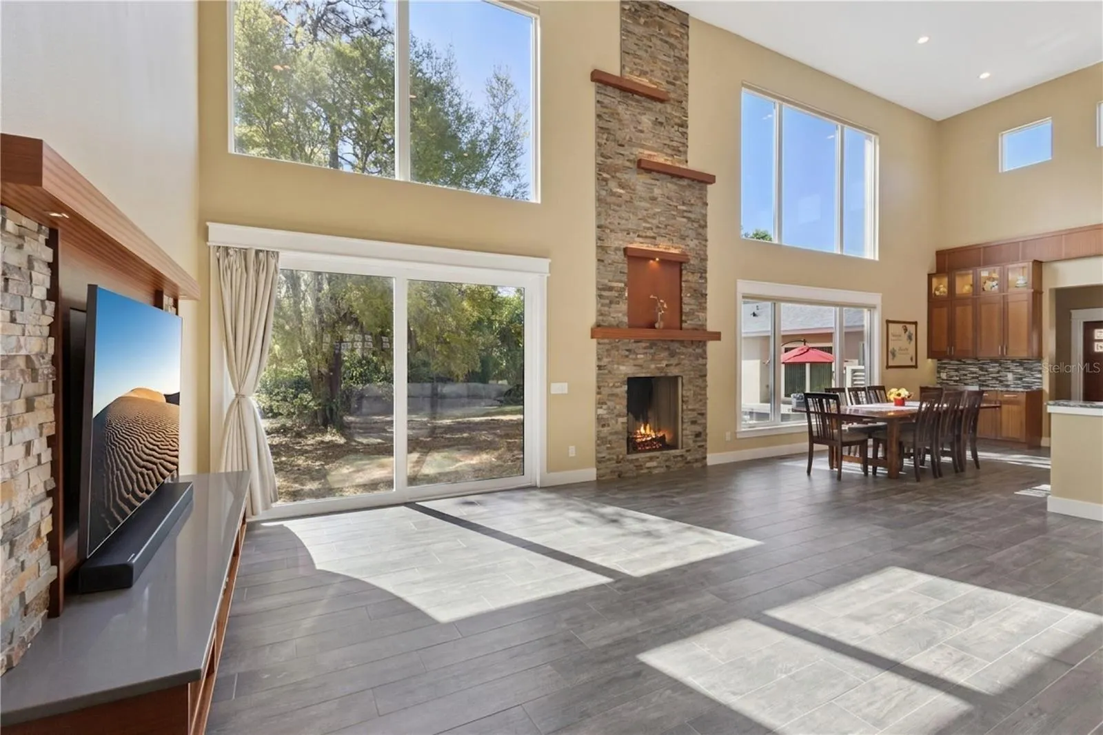 Main living area, open, light and bright with floor to ceiling windows