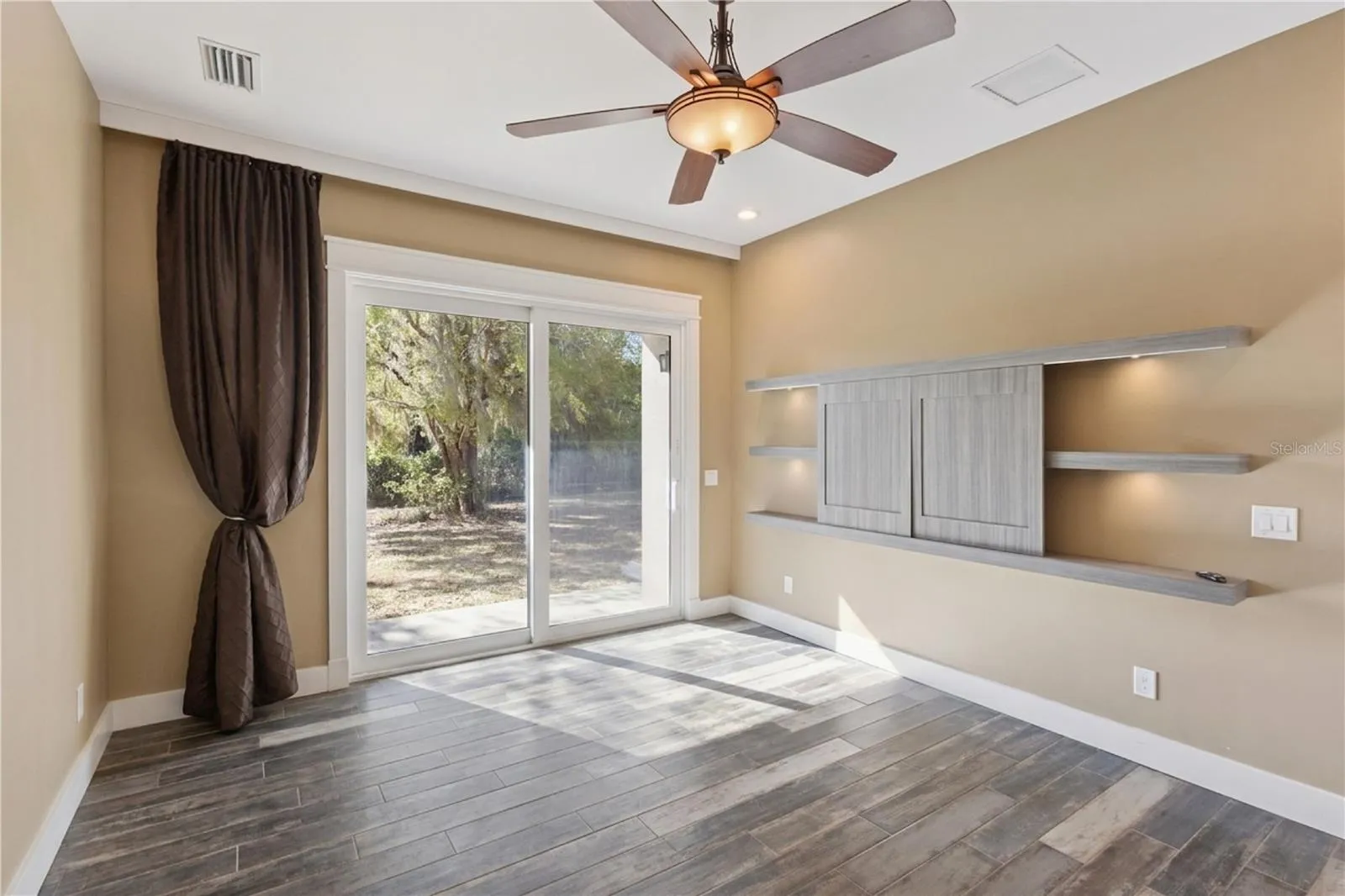 Master Bedroom  with custom built in for TV