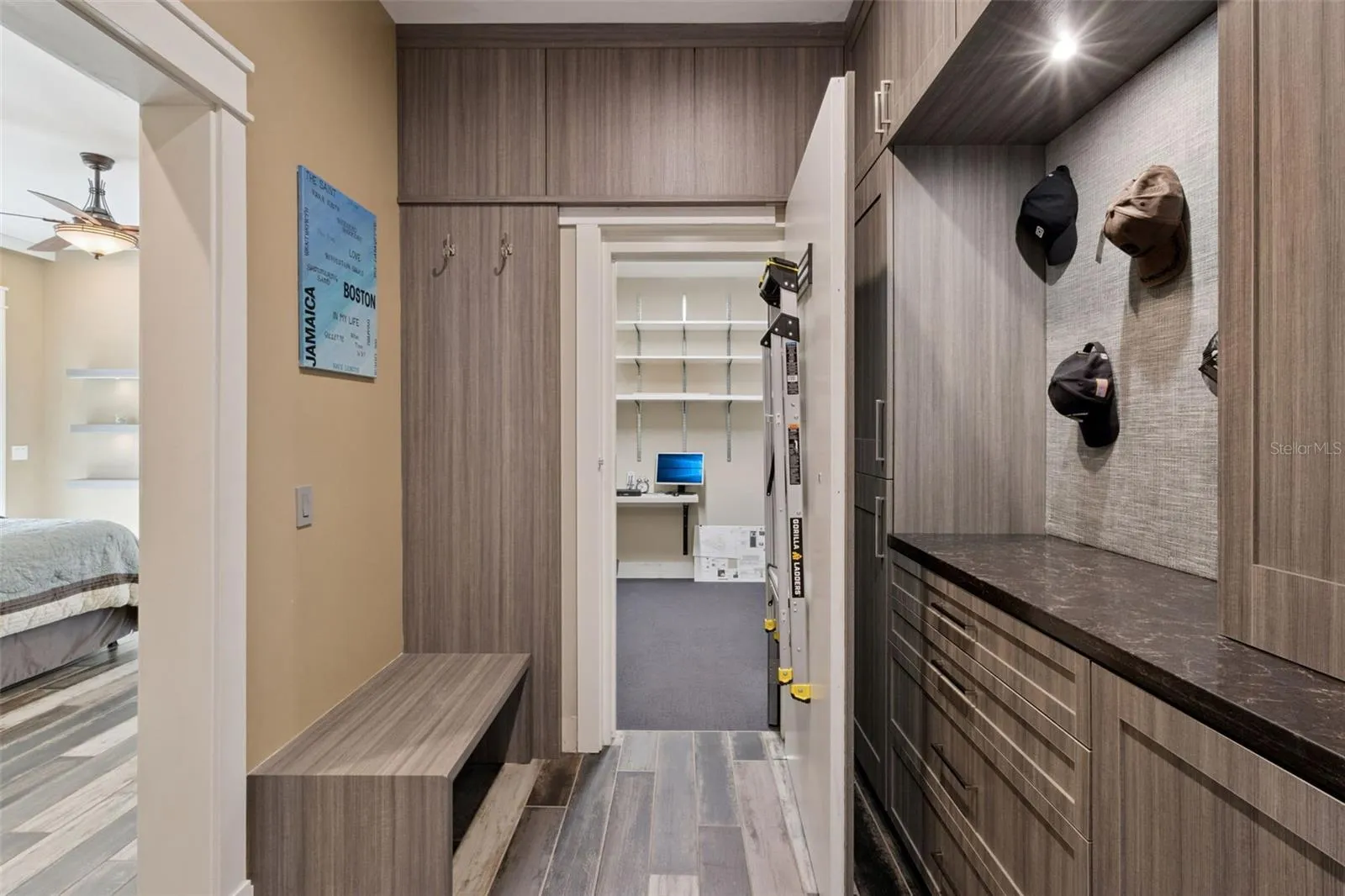 Master Bedroom custom closet with entrance to Safe Room
