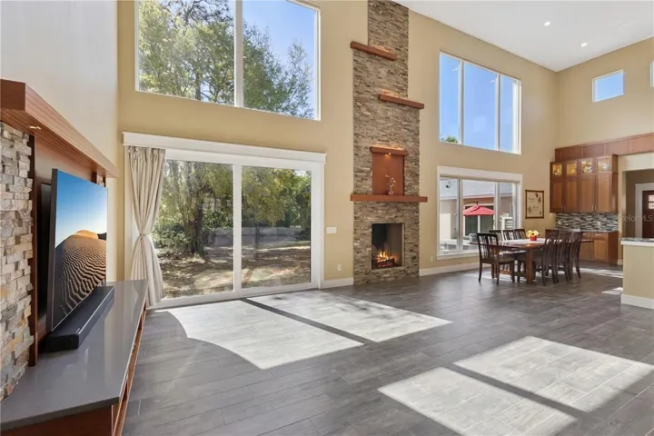 Main living area, open, light and bright with floor to ceiling windows