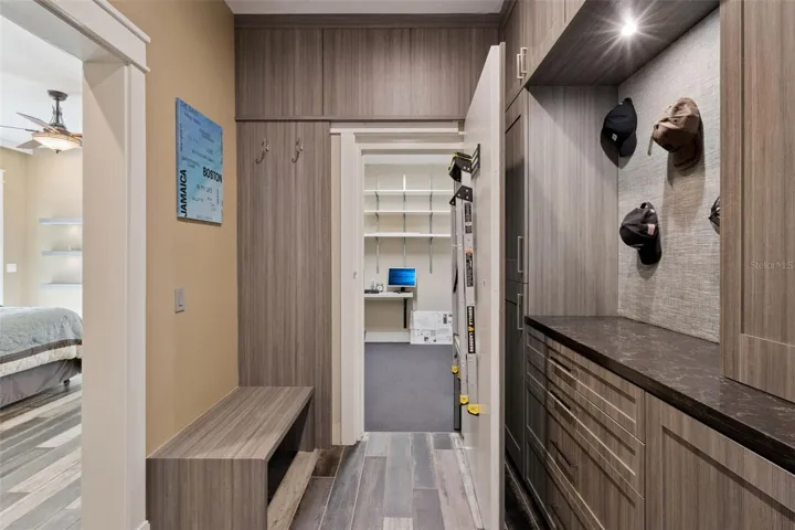 Master Bedroom custom closet with entrance to Safe Room