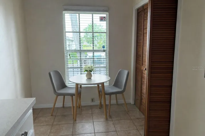 Virtually staged eat in kitchen area
