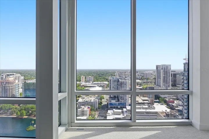 City view and sections of Lake Eola frame are stunning from this guest suite. A very special retreat for your future guests.