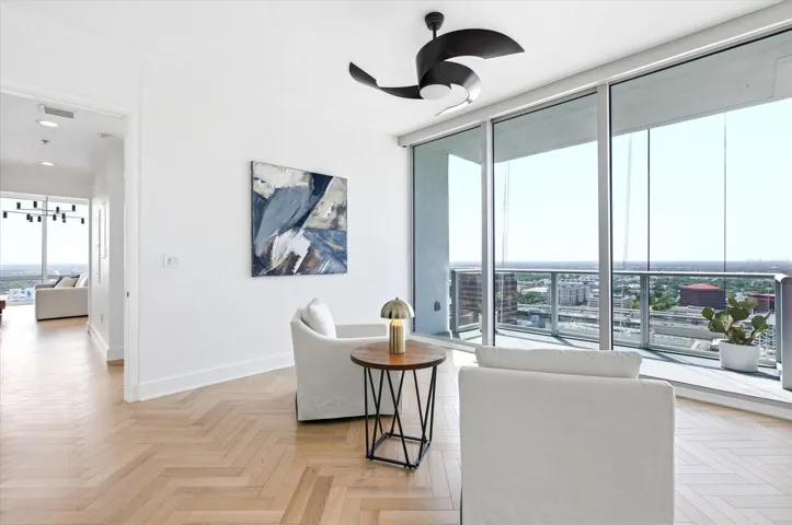 From the suite, the hallway connects back to the secondary rooms - clearing defining separation of the private wing.