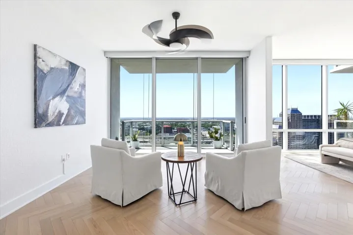 Private sitting lounge opens to its own balcony and extending the suite beyond the bedroom.