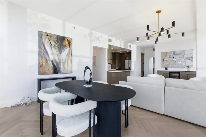 The dining area unfolds with quiet a presence  - intimate yet open, shaped by natural light, and a layout that feels inherently easy to live within.