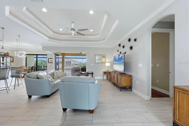 Stunning Living Room with pool and water views.