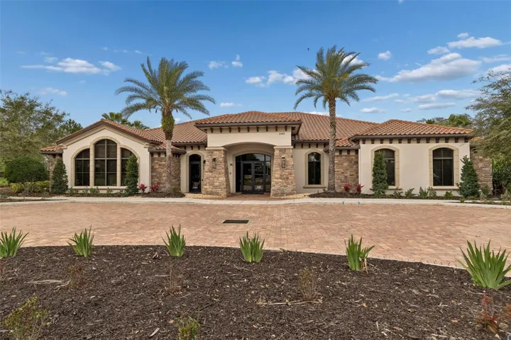 Resort-style pool, clubhouse, fitness center, tennis, pickleball, and an active social calendar.