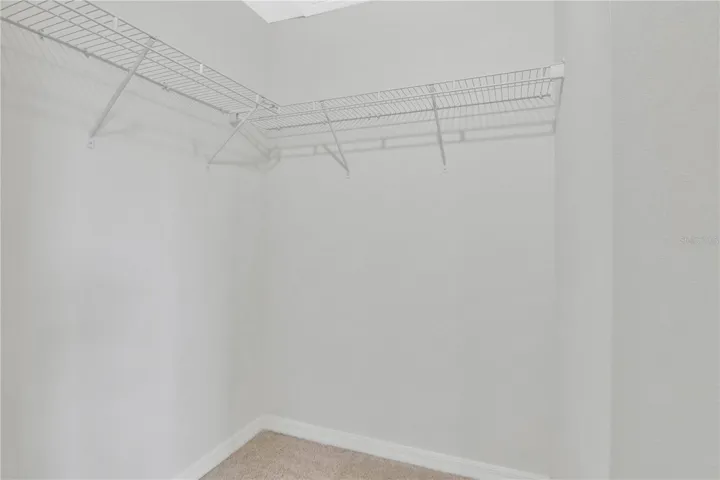 Walk-in closet offering great storage space.