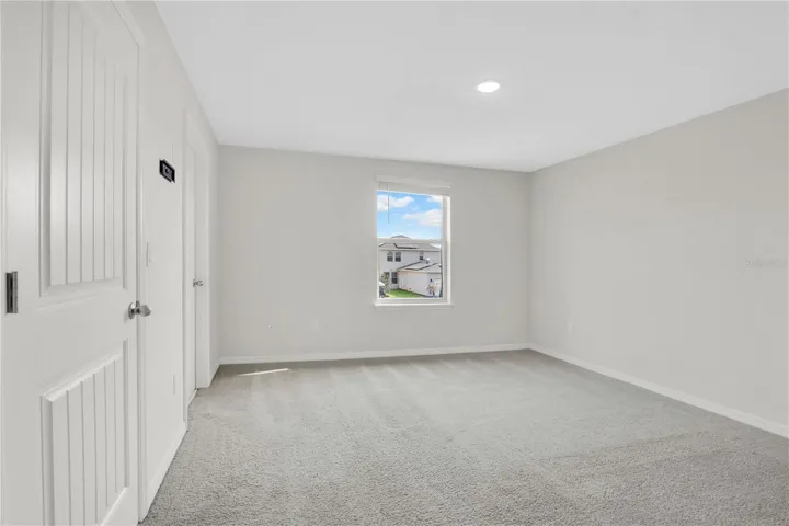 Comfortable primary suite with generous space and natural light