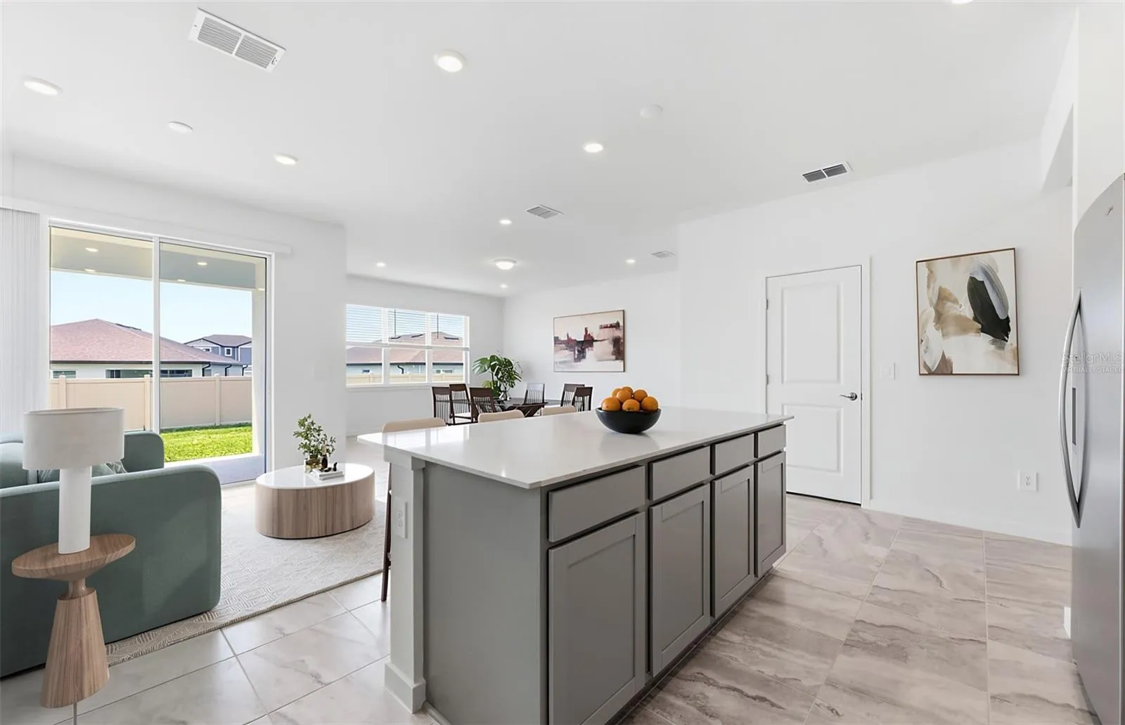 Virtually Staged - Open Kitchen to Gathering Room to Cafe