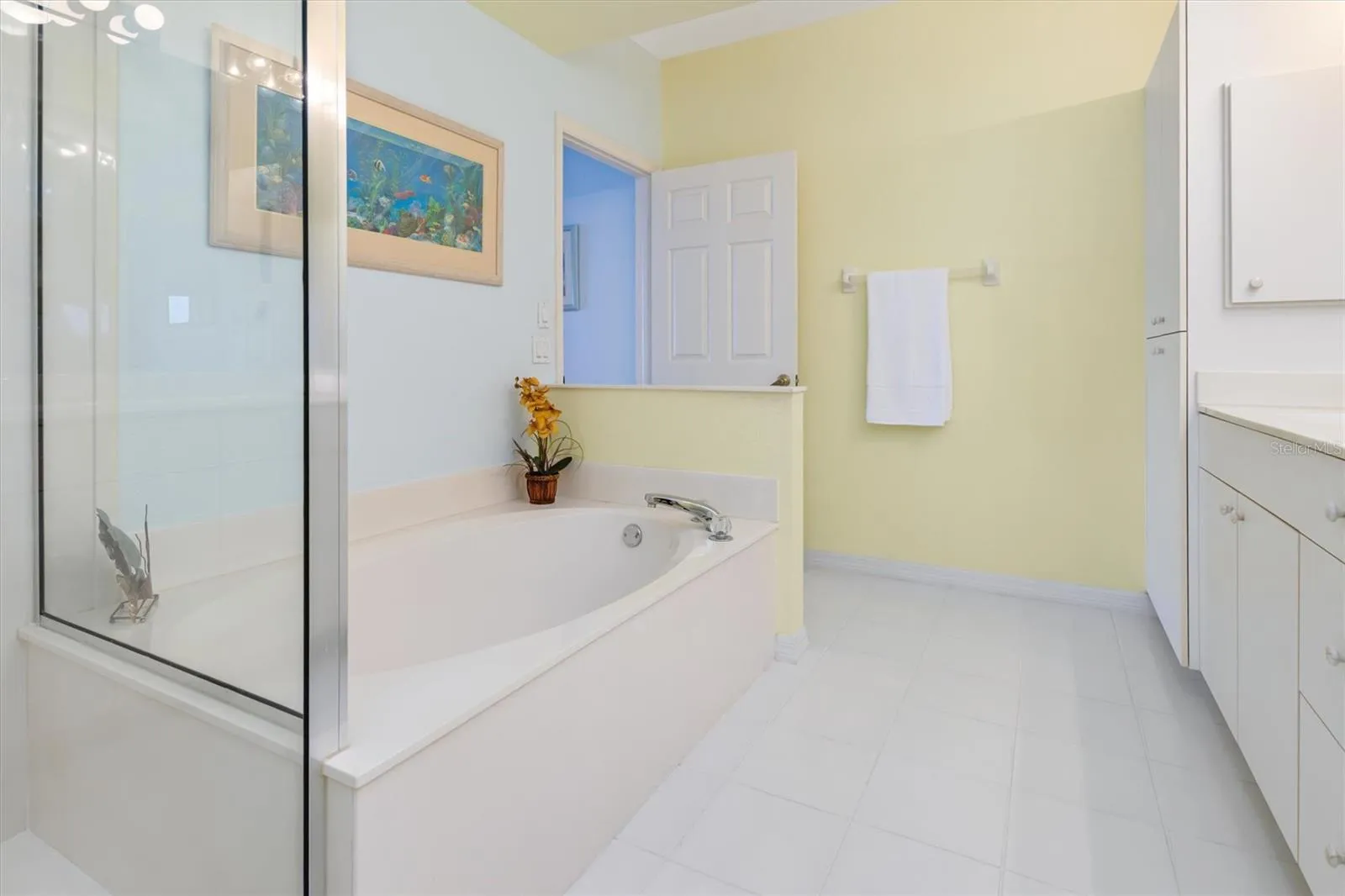 Primary Bath with separate tub, dual vanity and shower.